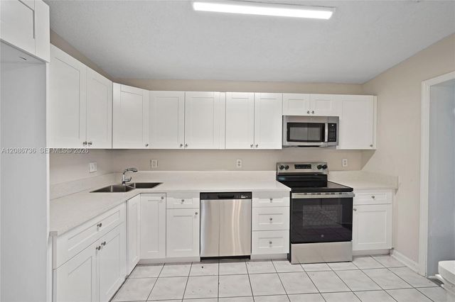 5618 Cinnamon Drive, West Palm Beach, FL 33415