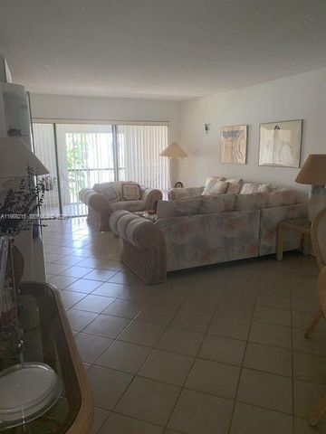 303 Racquet Club Rd 206, Weston, FL 33326