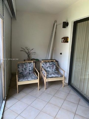 303 Racquet Club Rd 206, Weston, FL 33326