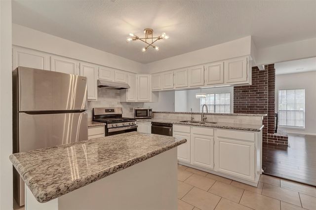 6 Green Slope Place, The Woodlands, TX 77381