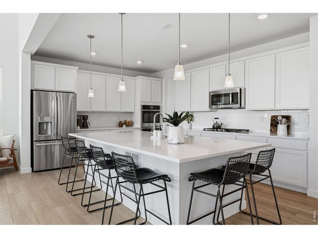 941 Wildrose Pl, Erie, CO 80516