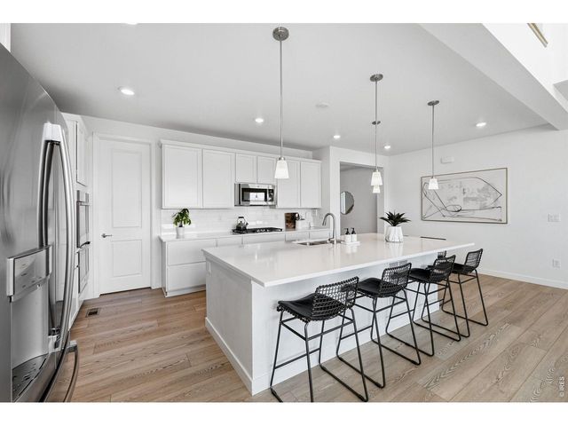 941 Wildrose Pl, Erie, CO 80516