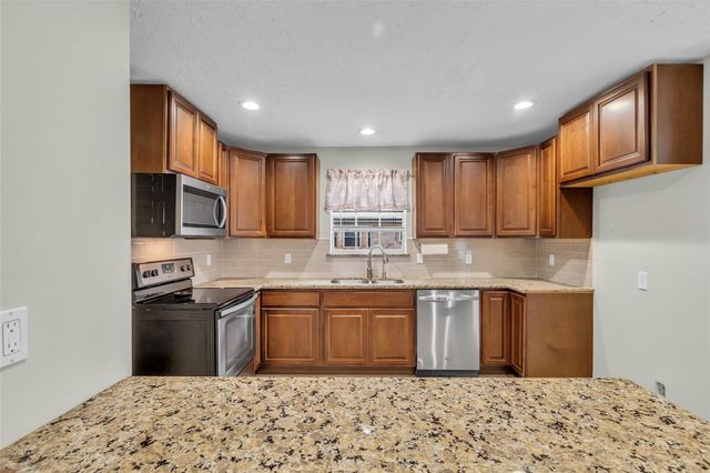 8115 Winding Oak Lane, Spring, TX 77379