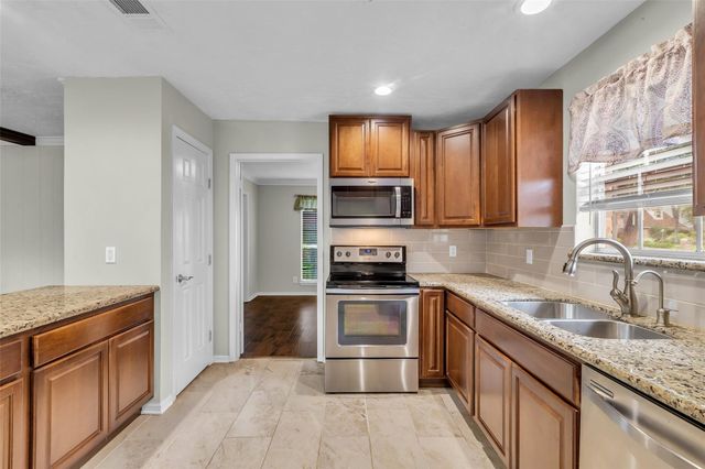 8115 Winding Oak Lane, Spring, TX 77379