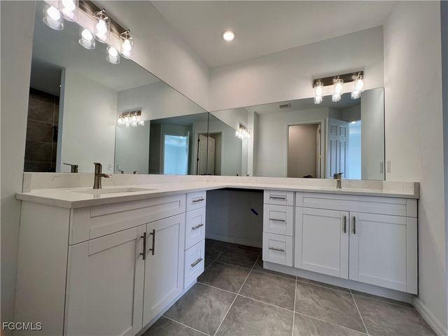 630 Falls LN, Lehigh Acres, FL 33974