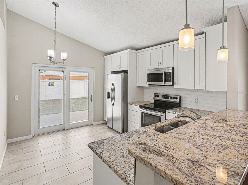 Image 6 of property listing at 6879 BELMAR DRIVE, Orlando, FL 32807