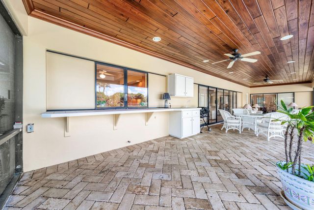 1851 Thatch Palm Drive, Boca Raton, FL 33432