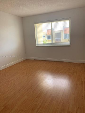 7703 Camino Real A-405, Miami, FL 33143