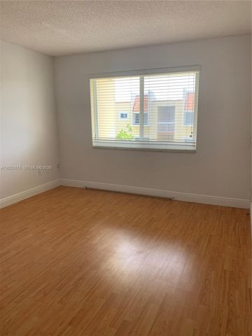 7703 Camino Real A-405, Miami, FL 33143