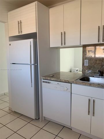 7703 Camino Real A-405, Miami, FL 33143