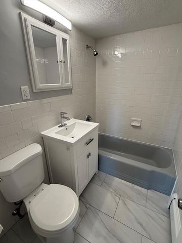 21 Warren 2-4, Waltham, MA 02453