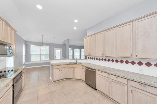 1819 Misty Falls Lane, Richmond, TX 77406