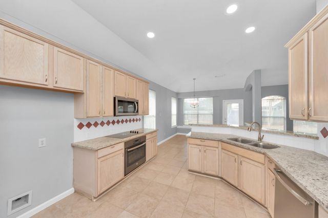 1819 Misty Falls Lane, Richmond, TX 77406