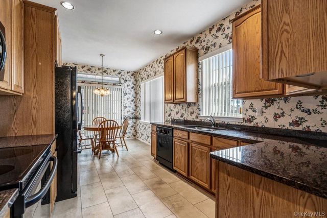 587 Leisure Drive, Ridge, NY 11961