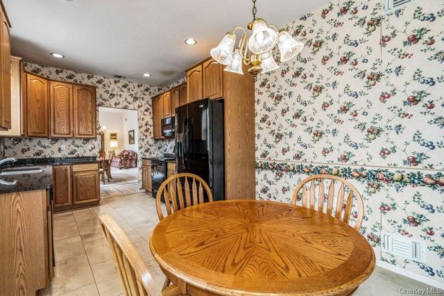 587 Leisure Drive, Ridge, NY 11961