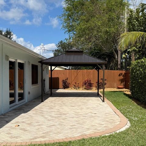 1611 Treemont Avenue, Jupiter, FL 33469