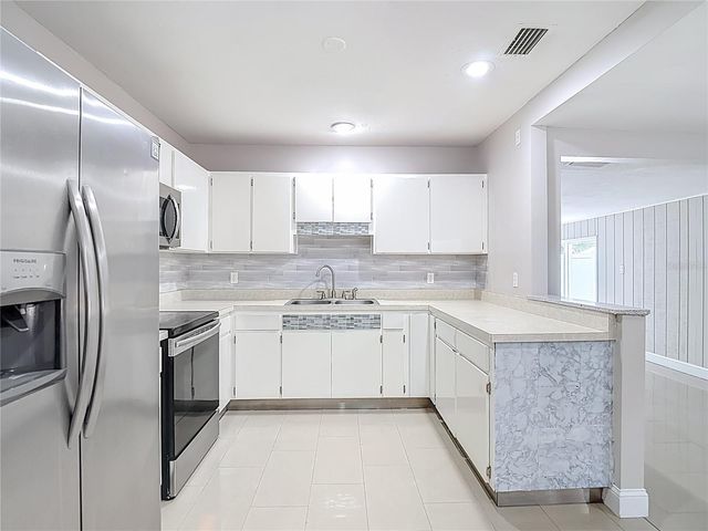 1328 DIVOT LANE, Tampa, FL 33612