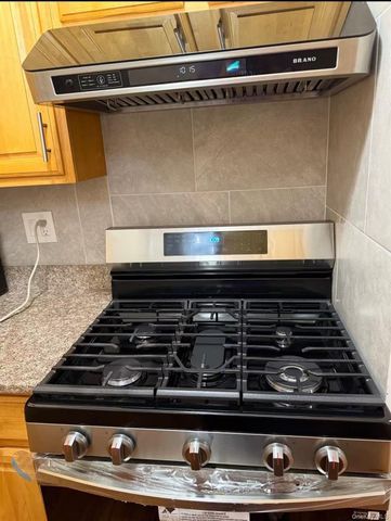 67-65 A cloverdale Lane, Oakland Gardens, NY 11364