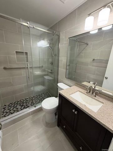 67-65 A cloverdale Lane, Oakland Gardens, NY 11364