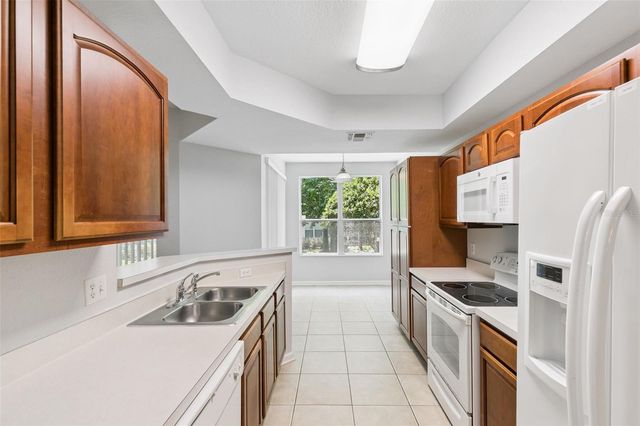 6450 ALCALDE COURT 103, Orlando, FL 32835