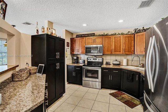 4941 Riverside Drive, Coral Springs, FL 33067