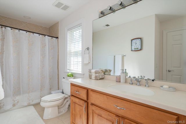26 Legends Circle, Melville, NY 11747