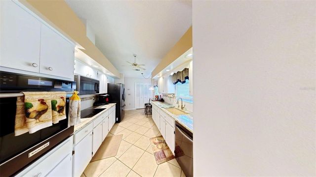 1410 NEW ABBEY AVENUE, Leesburg, FL 34788
