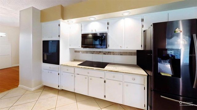 1410 NEW ABBEY AVENUE, Leesburg, FL 34788