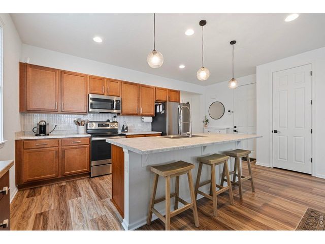 937 Eva Peak Dr, Erie, CO 80516