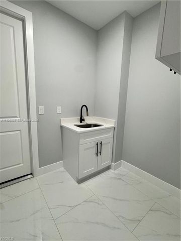 3414 4th ST SW, Lehigh Acres, FL 33976