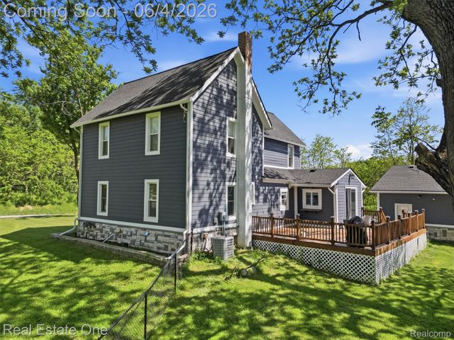 879 N Hacker Road, Oceola Township, MI 48843