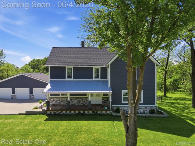 879 N Hacker Road, Oceola Township, MI 48843
