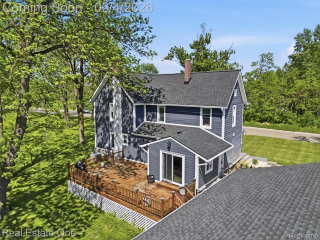 879 N Hacker Road, Oceola Township, MI 48843