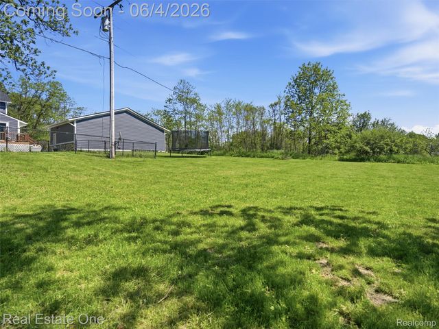 879 N Hacker Road, Oceola Township, MI 48843