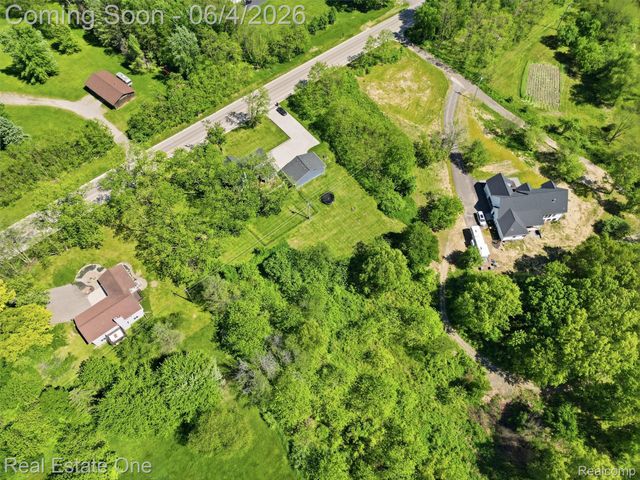 879 N Hacker Road, Oceola Township, MI 48843