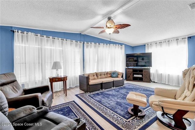 729 Gladiolus Drive, Barefoot Bay, FL 32976