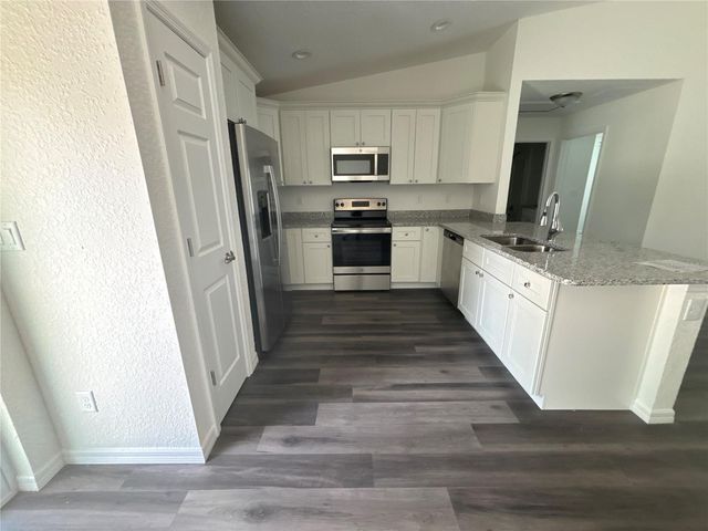 9 MALAUKA LOOP LANE, Ocklawaha, FL 32179