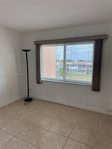 9041 Sunrise Lakes Boulevard 303, Sunrise, FL 33322