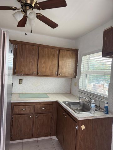 9041 Sunrise Lakes Boulevard 303, Sunrise, FL 33322