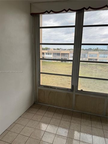 9041 Sunrise Lakes Boulevard 303, Sunrise, FL 33322