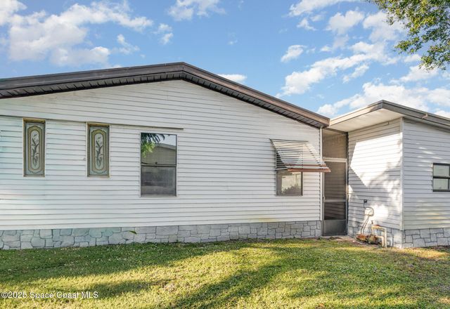 909 Dogwood Drive, Barefoot Bay, FL 32976