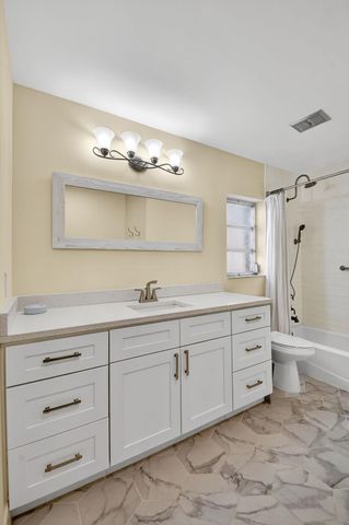 324 Orange Tree Drive 5, Atlantis, FL 33462