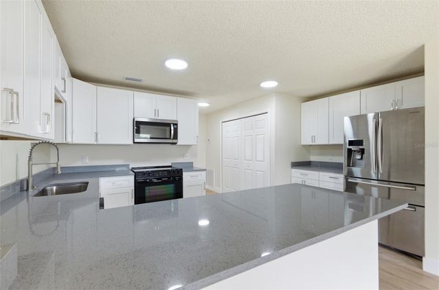 1591 MALALUKA STREET, Deltona, FL 32725