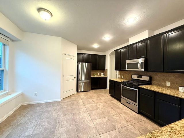 30515 Woodson Trace Drive, Spring, TX 77386