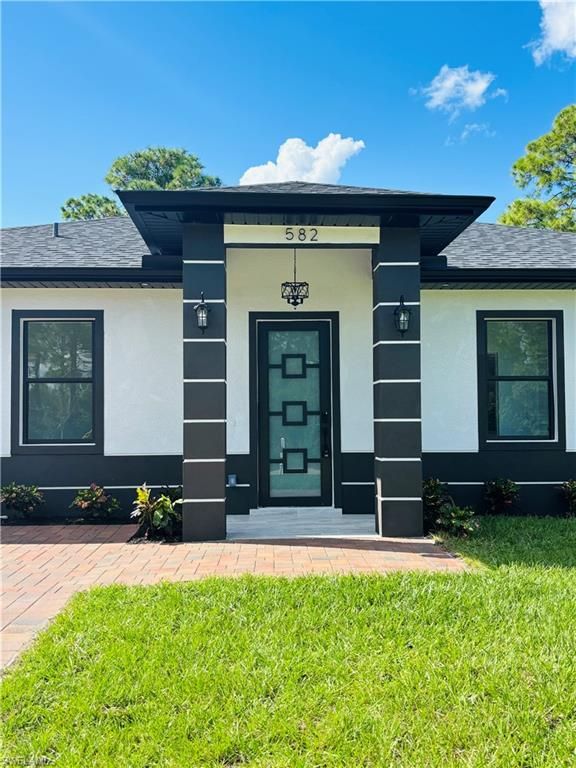 582 Eisenhower BLVD, LEHIGH ACRES, FL 33974 — photo 5