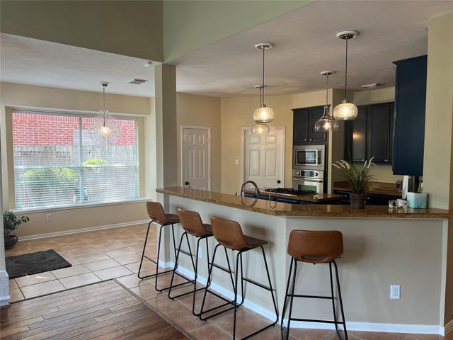 26 Merit Woods Place, The Woodlands, TX 77382