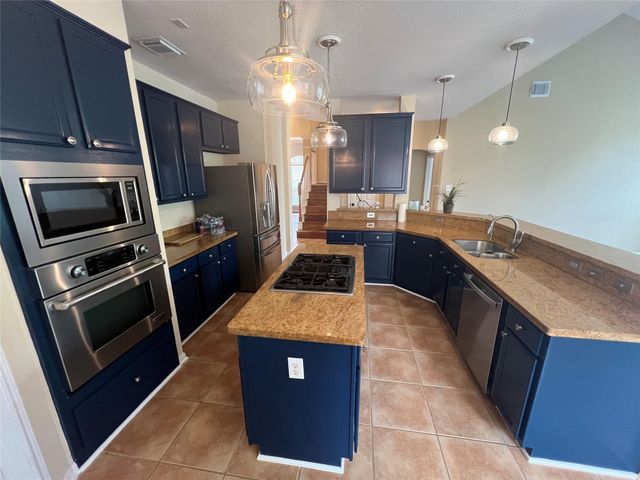 26 Merit Woods Place, The Woodlands, TX 77382