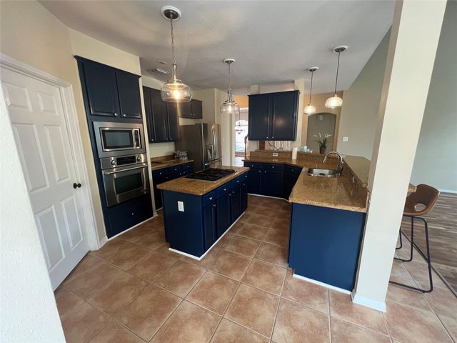 26 Merit Woods Place, The Woodlands, TX 77382