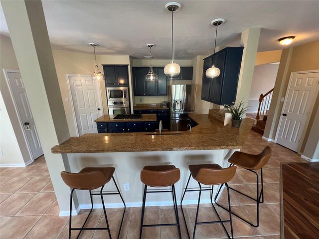 26 Merit Woods Place, The Woodlands, TX 77382