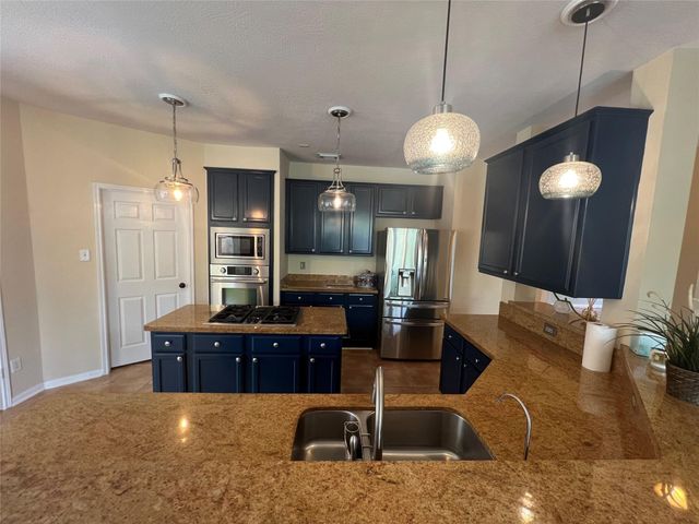 26 Merit Woods Place, The Woodlands, TX 77382